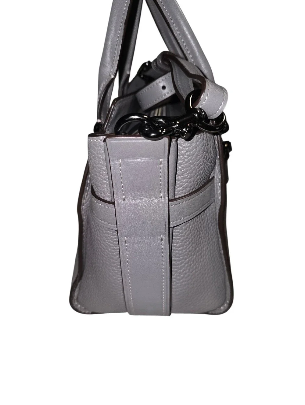 Coach Swagger 27 bag in a grey pebbled leather finish.